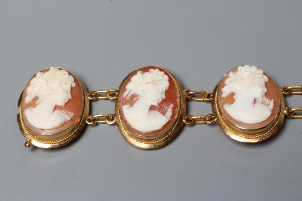 A SHELL CAMEO BRACELET, the eight oval panels carved with the head portrait of a young lady, in Image