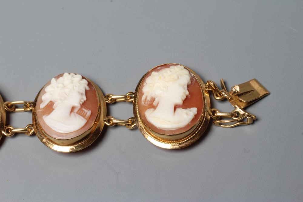 A SHELL CAMEO BRACELET, the eight oval panels carved with the head portrait of a young lady, in Image