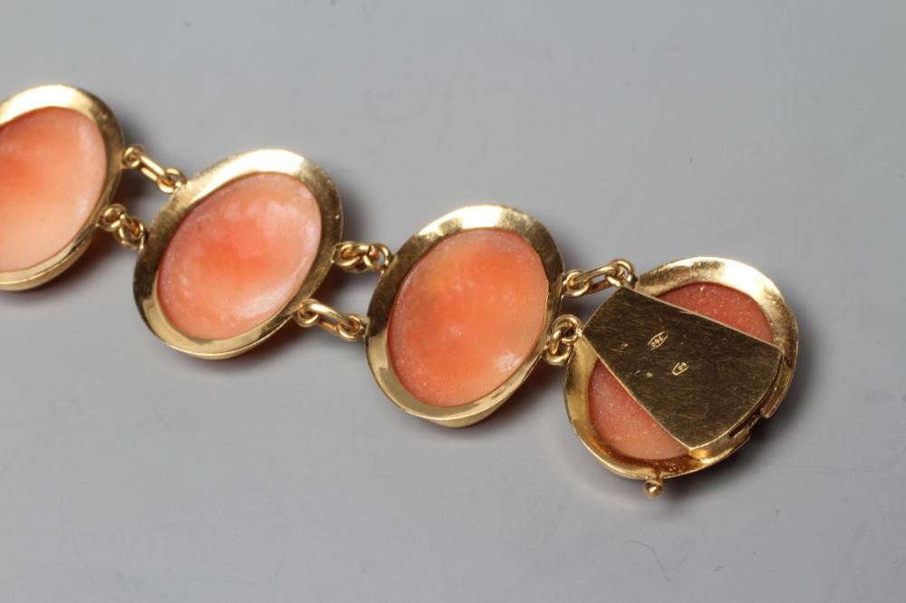 A SHELL CAMEO BRACELET, the eight oval panels carved with the head portrait of a young lady, in Image