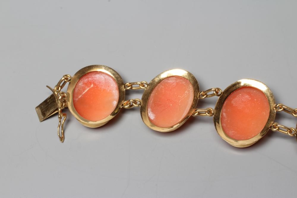 A SHELL CAMEO BRACELET, the eight oval panels carved with the head portrait of a young lady, in Image