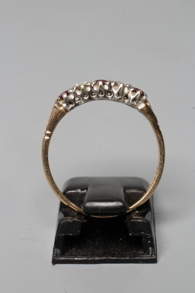 A RUBY AND DIAMOND RING, the three facet cut rubies and two round brilliant cut diamonds point set Image