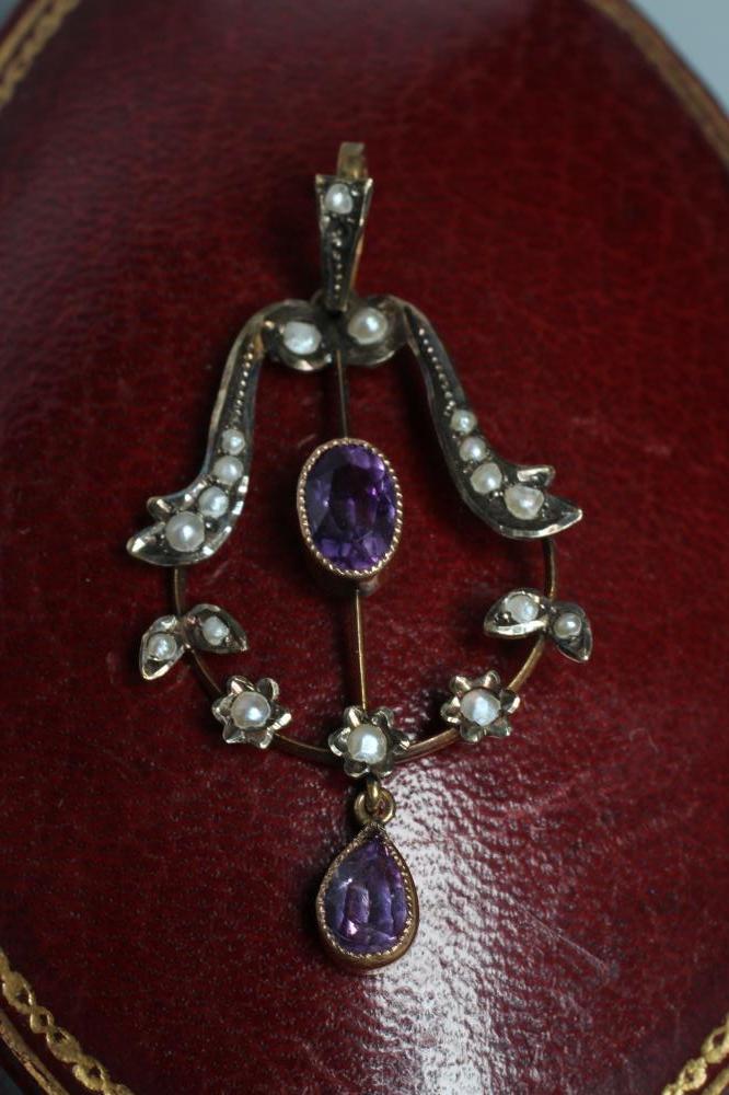 AN EDWARDIAN OPEN WIREWORK PENDANT Image