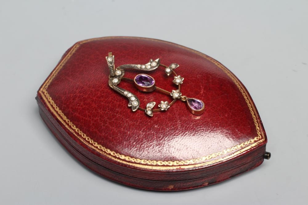 AN EDWARDIAN OPEN WIREWORK PENDANT Image