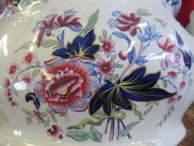 A VICTORIAN EARTHENWARE FOOTBATH of lobed bombe rounded oblong form with two scroll handles Image