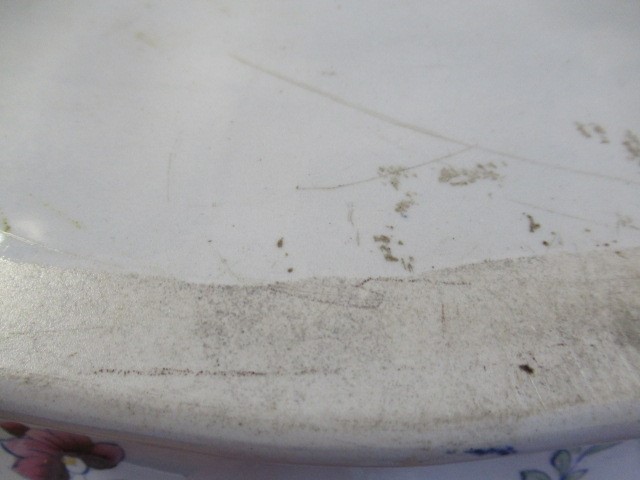 A VICTORIAN EARTHENWARE FOOTBATH of lobed bombe rounded oblong form with two scroll handles Image