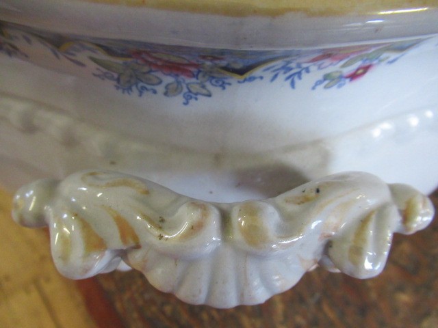 A VICTORIAN EARTHENWARE FOOTBATH of lobed bombe rounded oblong form with two scroll handles Image