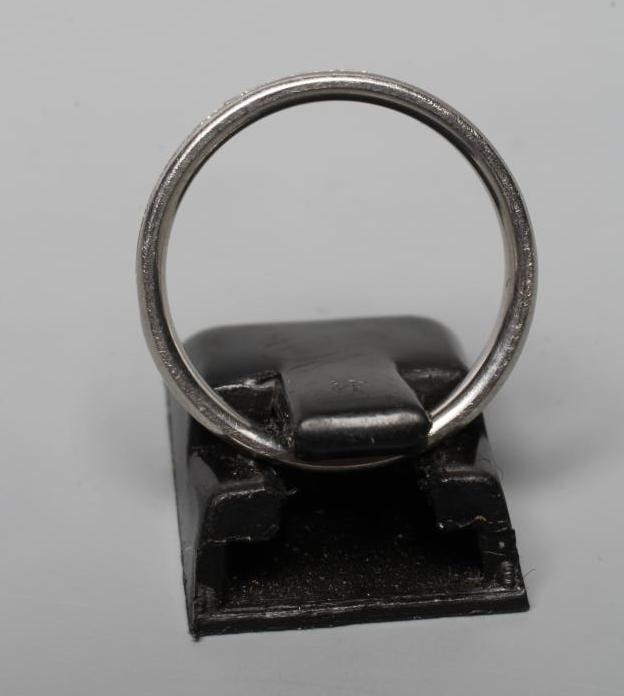 A DIAMOND HALF HOOP ETERNITY RING, the twenty seven Princess cut stones centrally channel set to a Image