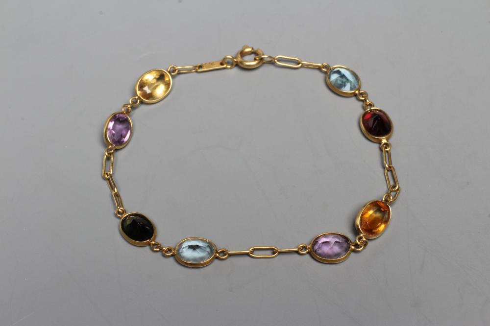 A MULTI-GEM BRACELET, the four pairs of facet cut coloured stones including garnet, aquamarine and Image