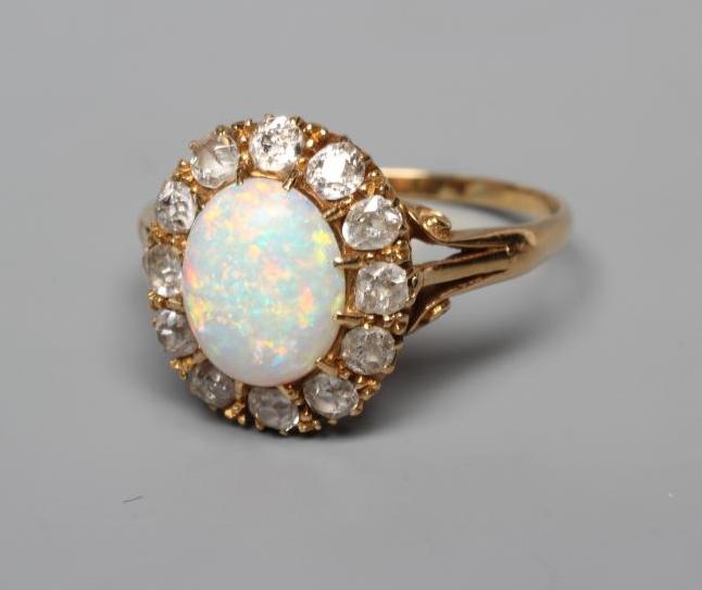 AN OPAL AND DIAMOND CLUSTER RING Image