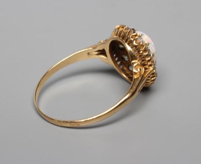 AN OPAL AND DIAMOND CLUSTER RING Image