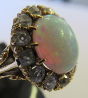 AN OPAL AND DIAMOND CLUSTER RING Image