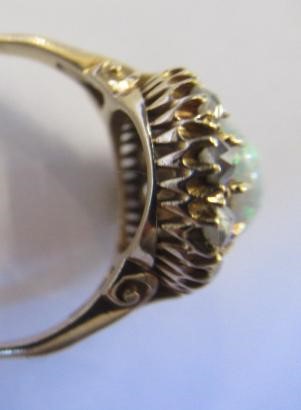 AN OPAL AND DIAMOND CLUSTER RING Image