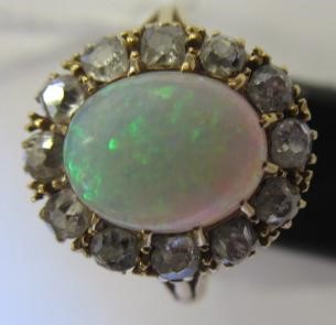 AN OPAL AND DIAMOND CLUSTER RING Image