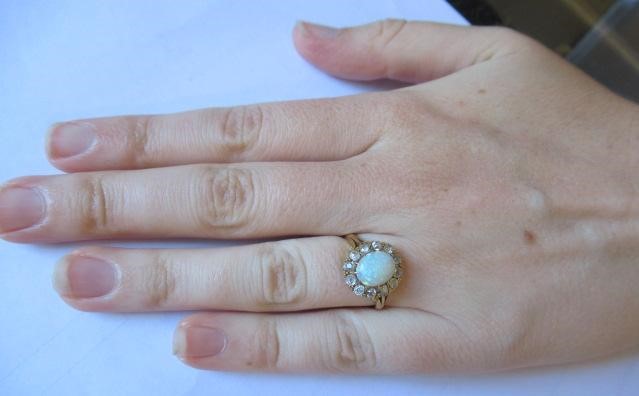 AN OPAL AND DIAMOND CLUSTER RING Image