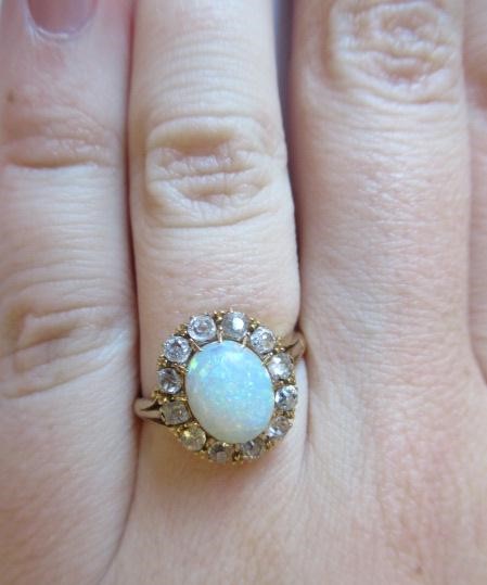 AN OPAL AND DIAMOND CLUSTER RING Image