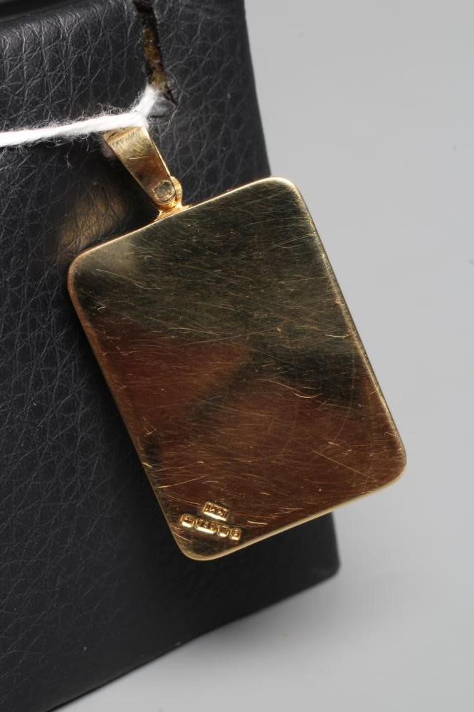 AN 18CT GOLD PENDANT of rounded oblong form with an asymetric 'twist' detail point set with six Image