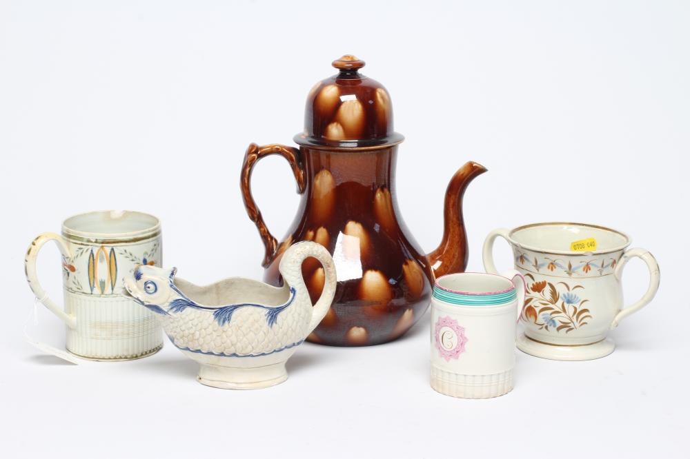 A COLLECTION OF ENGLISH PEARLWARE comprising a cylindrical mug with engine turned rim Image