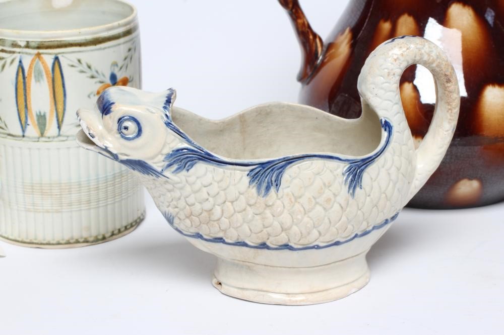 A COLLECTION OF ENGLISH PEARLWARE comprising a cylindrical mug with engine turned rim Image