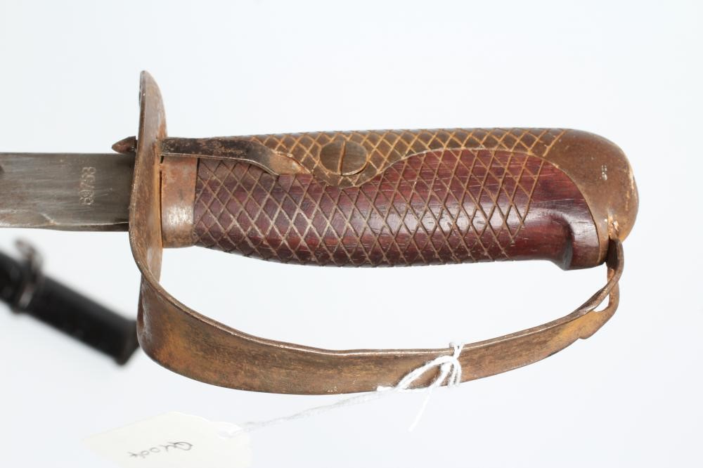 A JAPANESE 1899 PATTERN CAVALRY SWORD, the 30" blade stamped 69753, steel hand guard, wooden grip Image