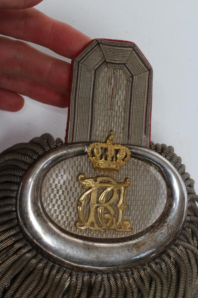 A PAIR OF IMPERIAL GERMAN EPAULETTES with white metal decoration, sprung metal tassels, and gilt Image