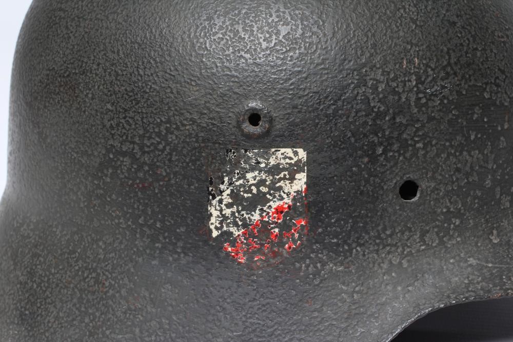 A GERMAN THIRD REICH HELMET of typical form with remnants of side transfers, 11 3/8" front to back Image
