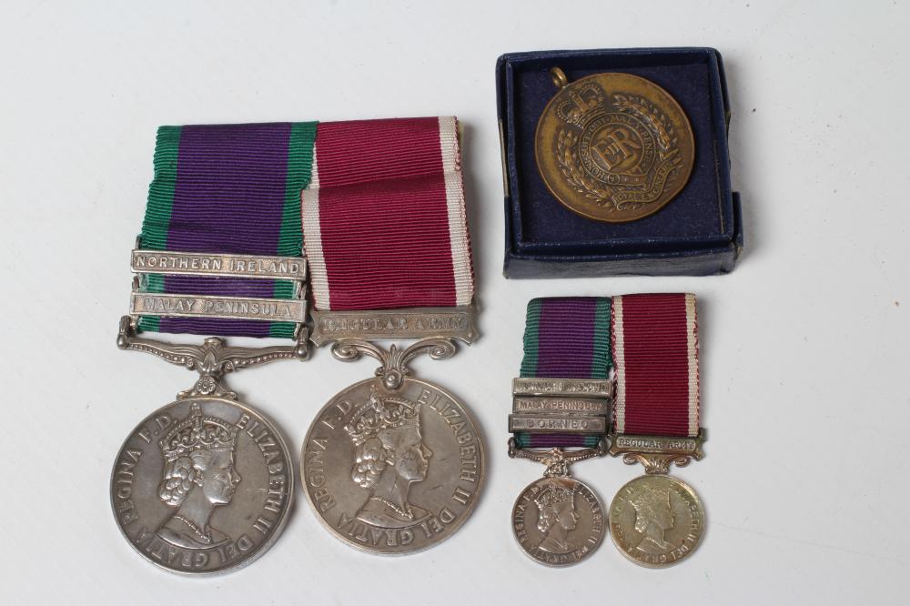 TWO ELIZABETH II MEDALS Image