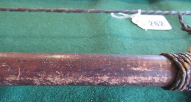 EAST AFRICAN WEAPONS, comprising a 59" long wooden bow with gut wrappings and string, three bamboo Image