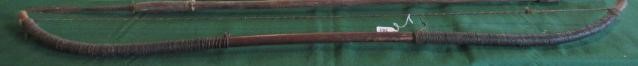 EAST AFRICAN WEAPONS, comprising a 59" long wooden bow with gut wrappings and string, three bamboo Image