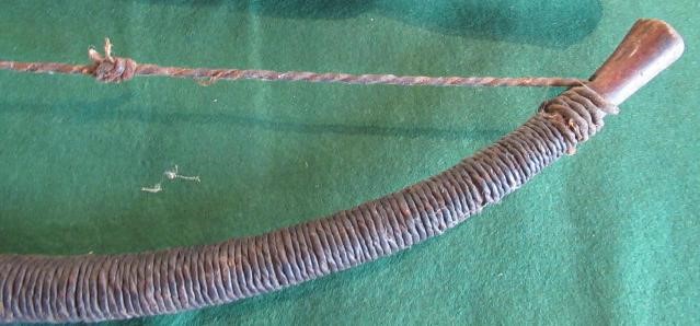 EAST AFRICAN WEAPONS, comprising a 59" long wooden bow with gut wrappings and string, three bamboo Image