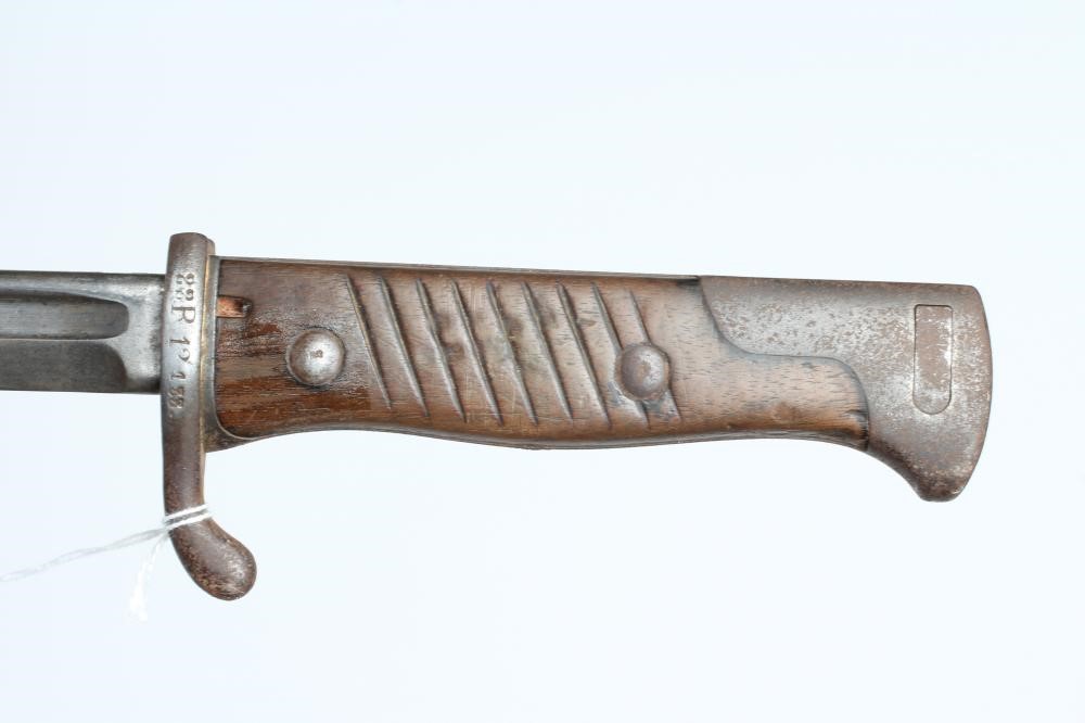 A GERMAN M1889 BAYONET with 20 1/4" pipe back blade, maker's mark for G.G. Haenel, hilt inscribed Image