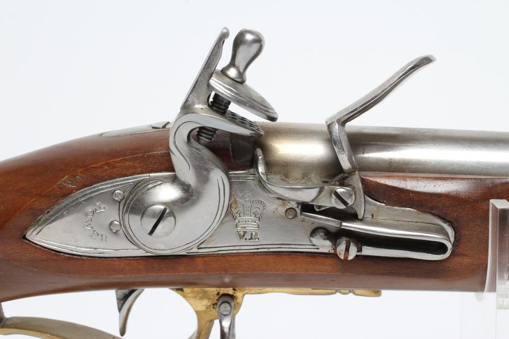 AN INERT FLINTLOCK BAKER RIFLE of modern high quality production with 30 3/4" steel barrel Image