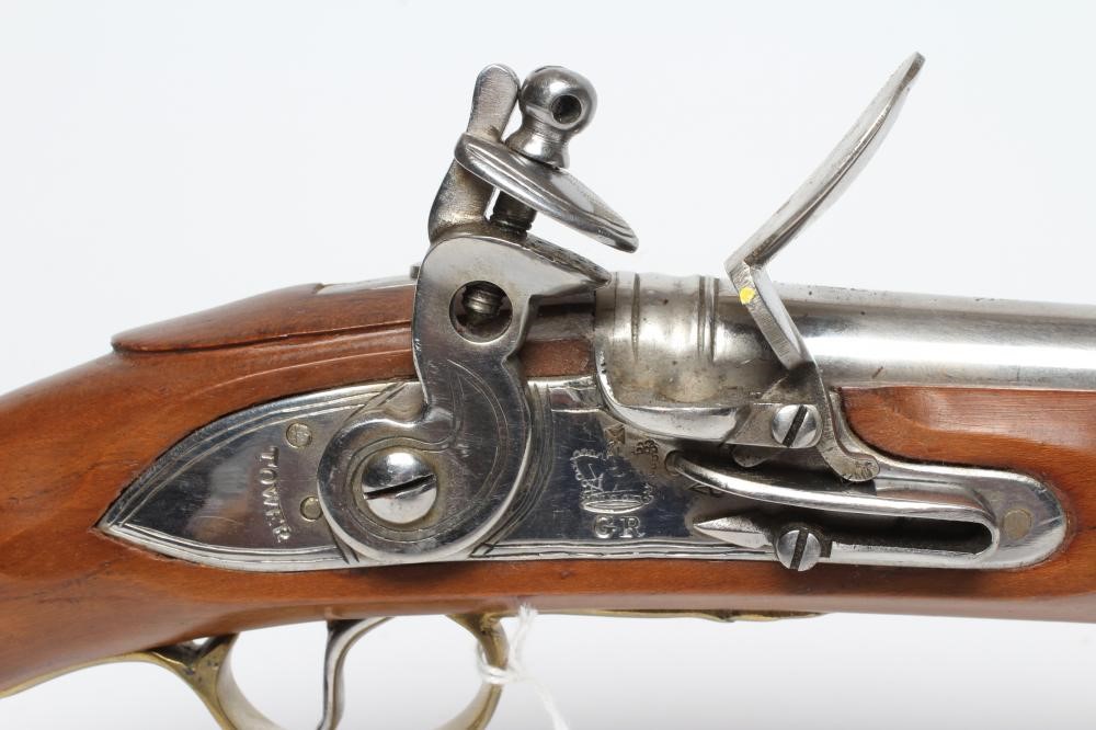 AN INERT SEA SERVICE FLINTLOCK HOLSTER PISTOL of modern high quality production with 12" barrel Image
