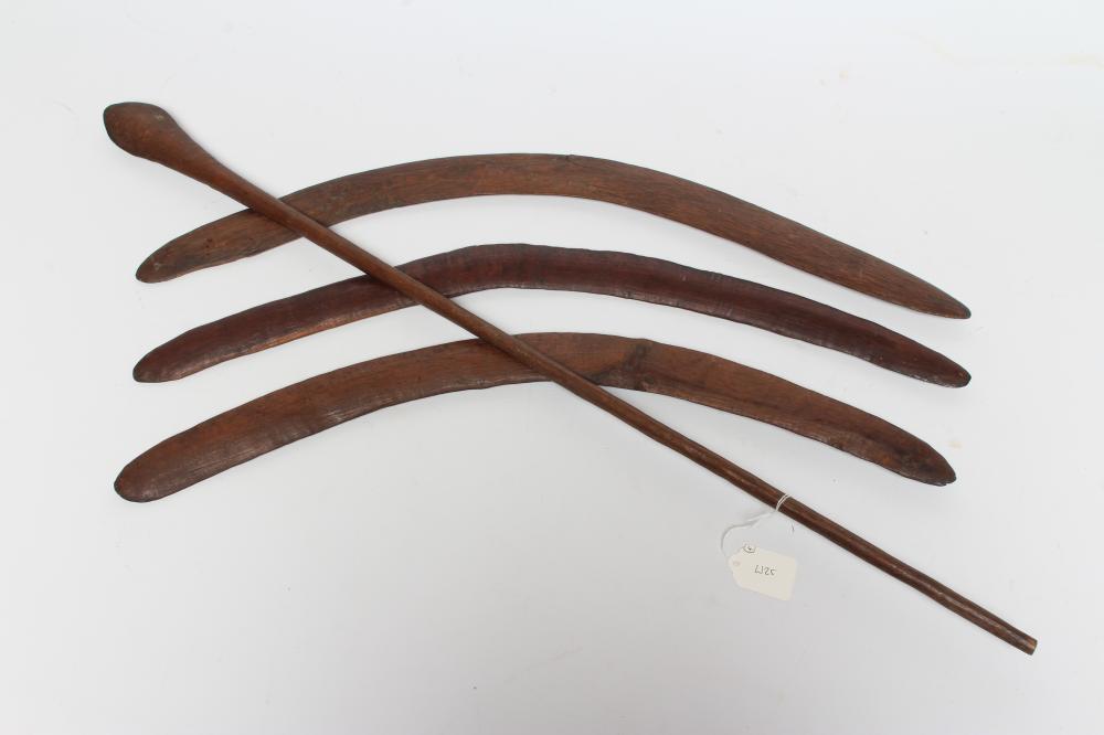 ABORIGINAL TOOLS AND WEAPONS, c.1900, comprising three Boomerangs with linear carved patination, Image