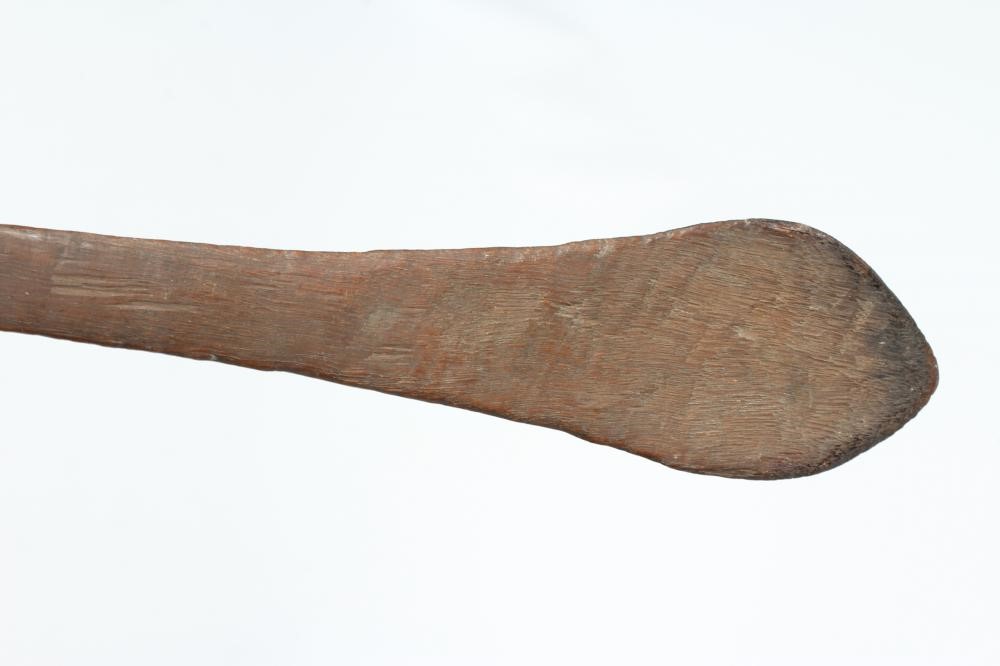 ABORIGINAL TOOLS AND WEAPONS, c.1900, comprising three Boomerangs with linear carved patination, Image