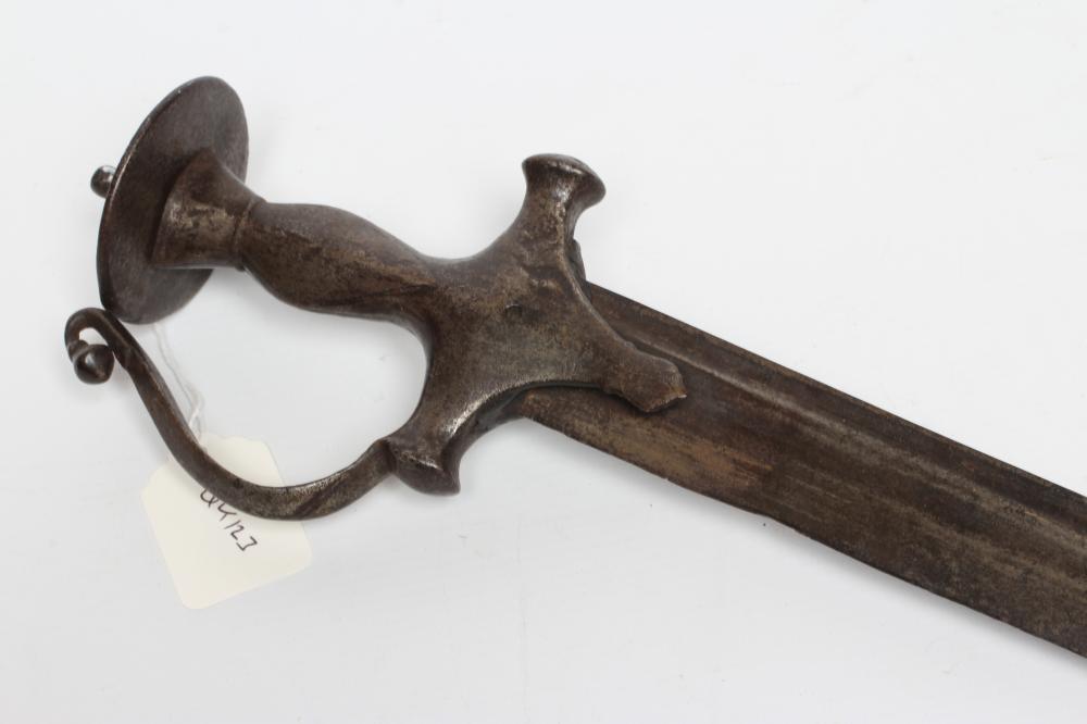 AN INDIAN TALWAR, 19th century, with 34 1/4" curved and twin fullered blade, the steel hilt of Image