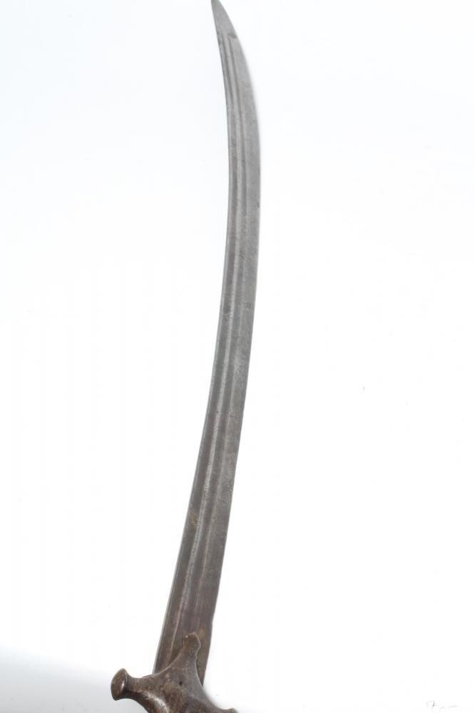 AN INDIAN TALWAR, 19th century, with 34 1/4" curved and twin fullered blade, the steel hilt of Image