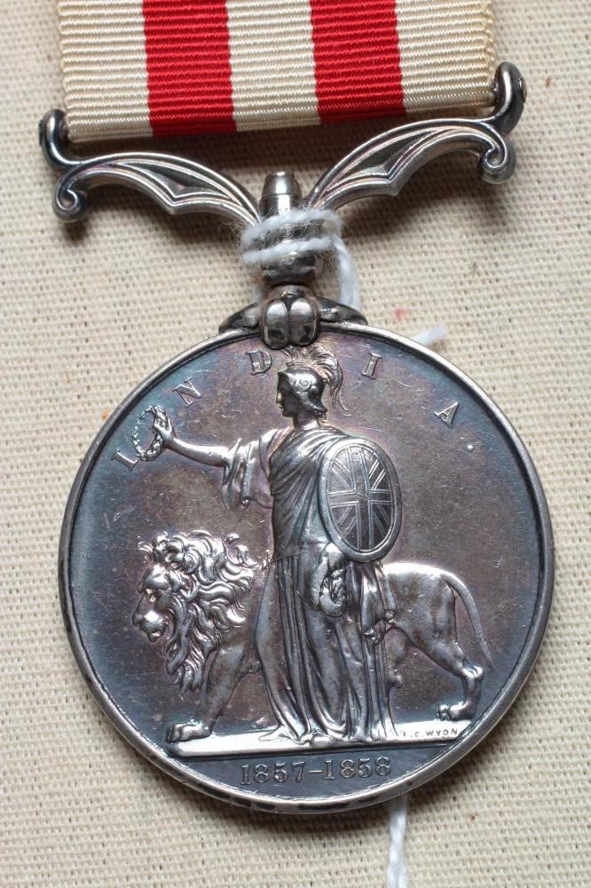 AN INDIAN MUTINY MEDAL awarded to Cuthbert Alderson of the 34th Regiment (Est. plus 24% premium inc. Image
