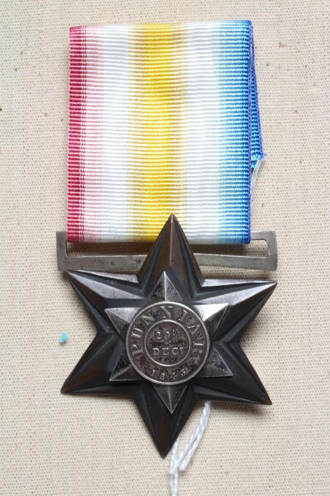 A GWALIOR STAR 1843 MEDAL, PUNNIAR awarded to Private Robert Henderson of the Queen's Royal Lancers Image