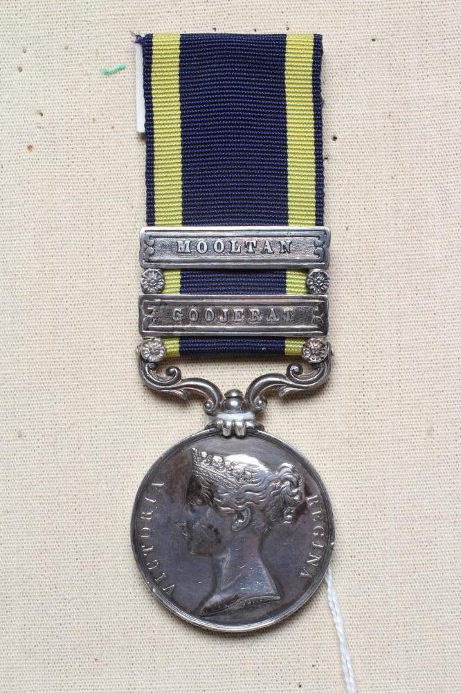 A PUNJAB MEDAL with Mooltan and Goojerat clasps, awarded to James Garland of the 32nd Foot (Est. Image