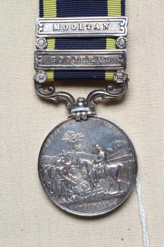 A PUNJAB MEDAL with Mooltan and Goojerat clasps, awarded to James Garland of the 32nd Foot (Est. Image