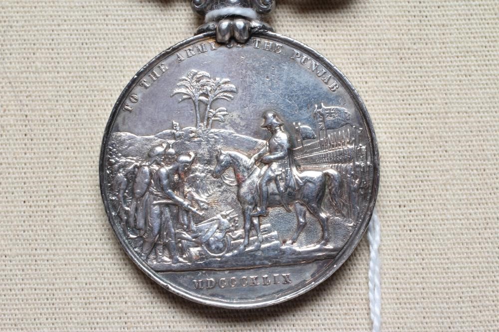 A PUNJAB MEDAL with Mooltan and Goojerat clasps, awarded to James Garland of the 32nd Foot (Est. Image