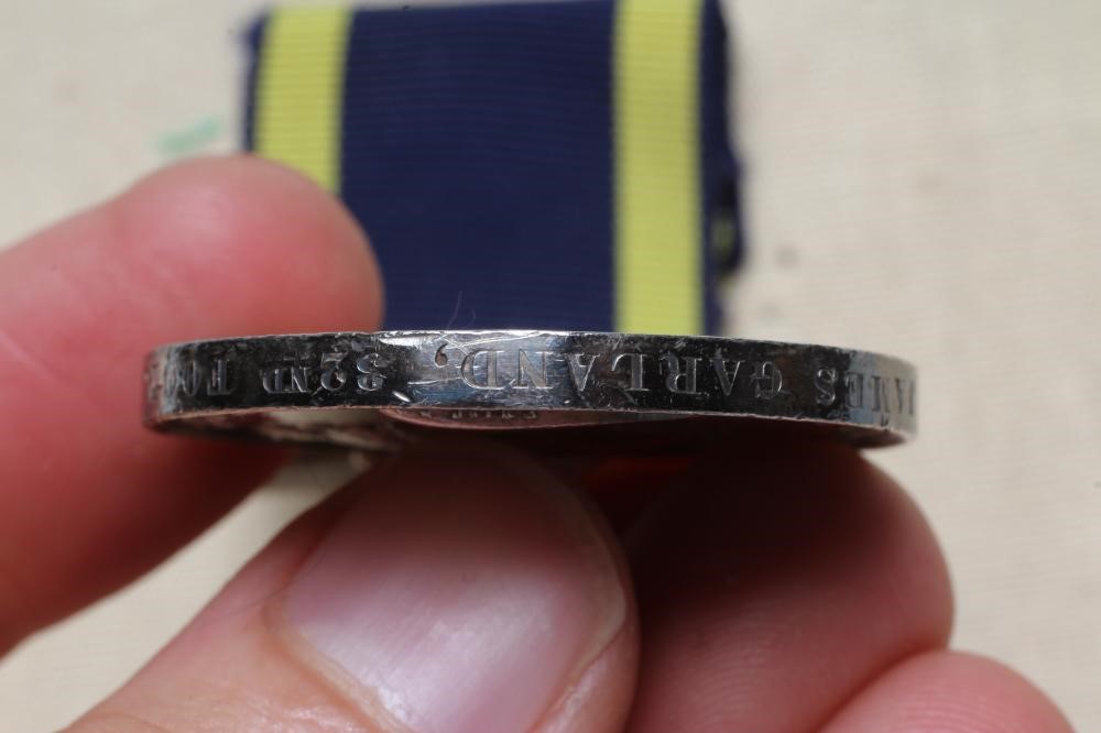 A PUNJAB MEDAL with Mooltan and Goojerat clasps, awarded to James Garland of the 32nd Foot (Est. Image
