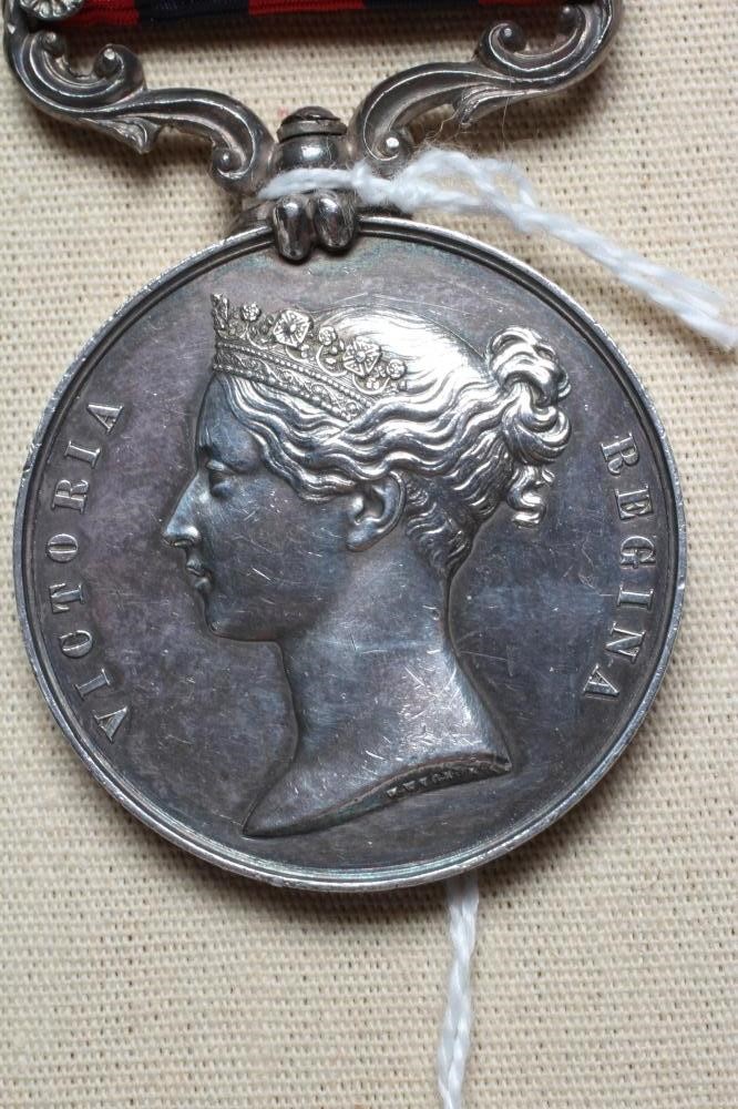 AN INDIAN GENERAL SERVICE MEDAL 1854 with Pegu clasp, awarded to John Sweeney of the 18th Royal Image