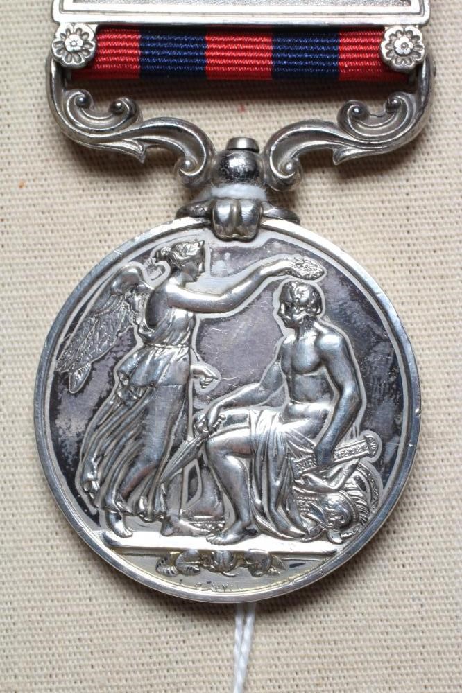 AN INDIAN GENERAL SERVICE MEDAL 1854 with Umbeyla clasp, awarded to Frederick Lawrence of the 1st Image