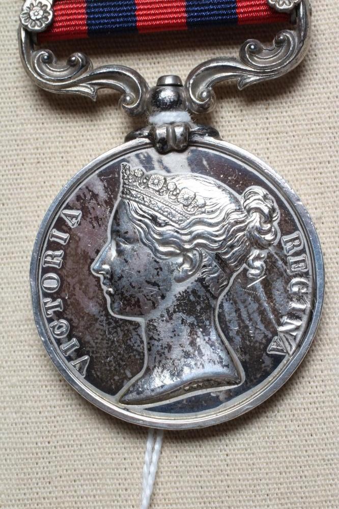 AN INDIAN GENERAL SERVICE MEDAL 1854 with Umbeyla clasp, awarded to Frederick Lawrence of the 1st Image