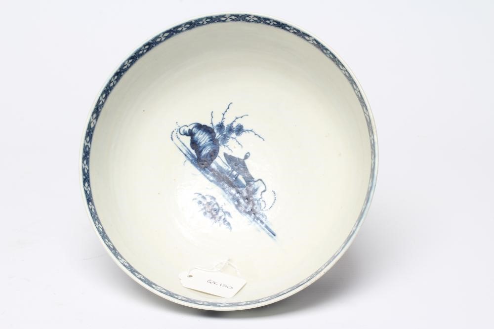 A WORCESTER PORCELAIN PRECIPICE PATTERN BOWL, c.1770, of plain circular form painted in underglaze Image