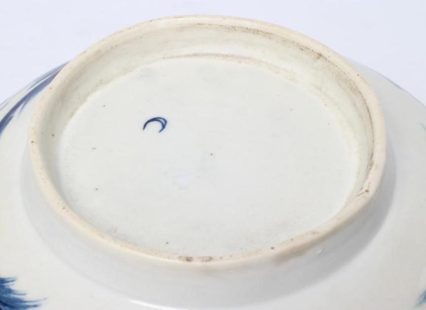 A WORCESTER PORCELAIN PRECIPICE PATTERN BOWL, c.1770, of plain circular form painted in underglaze Image