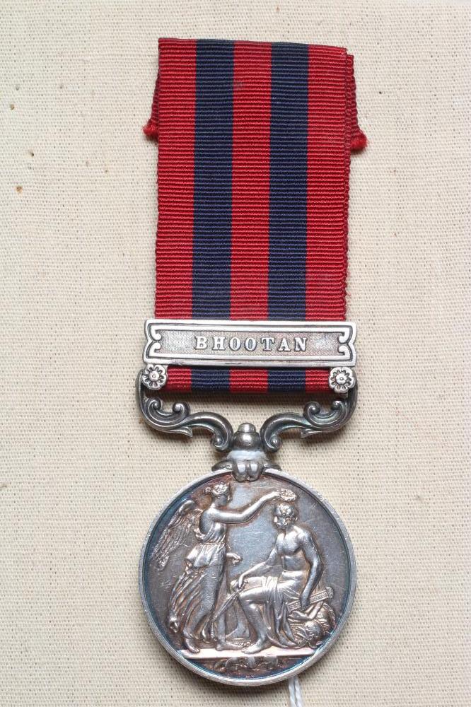 AN INDIAN GENERAL SERVICE MEDAL 1854 with Bhootan clasp, awarded to Thomas Tobin of H.M's 55th Image