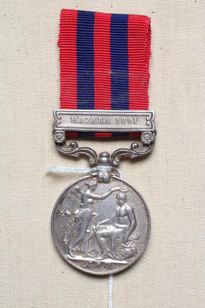 AN INDIAN GENERAL SERVICE MEDAL 1854 with Hazara 1891 clasp, awarded to Sepoy Ram Sign of the Image