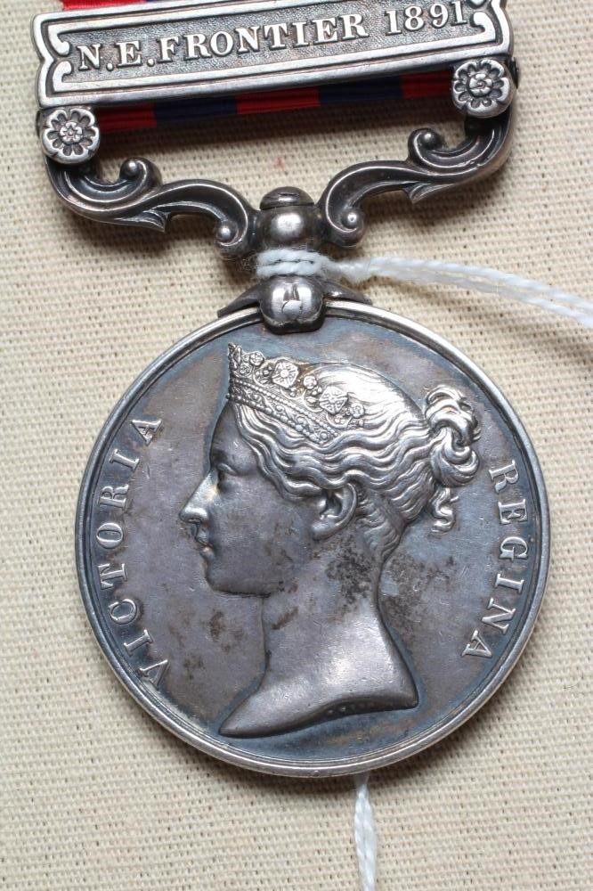 AN INDIAN GENERAL SERVICE MEDAL 1854 with North Eastern Frontier 1891 clasp, awarded to Naru Pun of Image